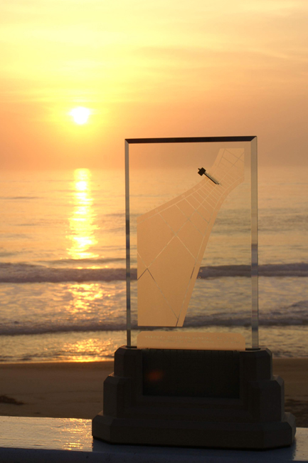 Spectra sundial greets the ocean sunrise on Cape Hatteras, North Carolina USA